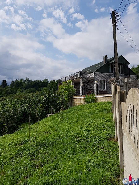 House with a plot near a waterfall near Batumi